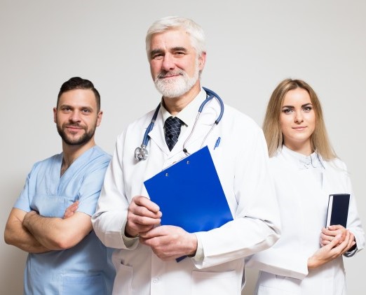 A group of doctors standing next to each other.