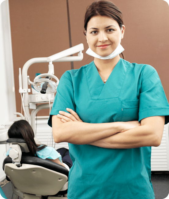 Dentist with patient in treatment room